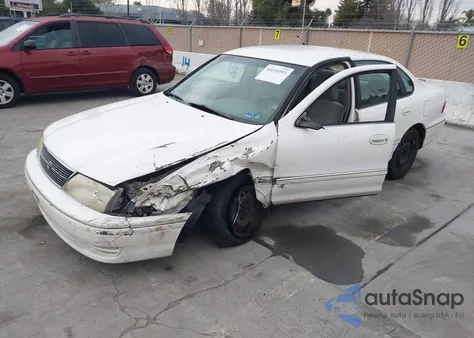 1998 Toyota Avalon Xl z USA, uszkodzony, nr VIN 4T1BF18B9WU287760